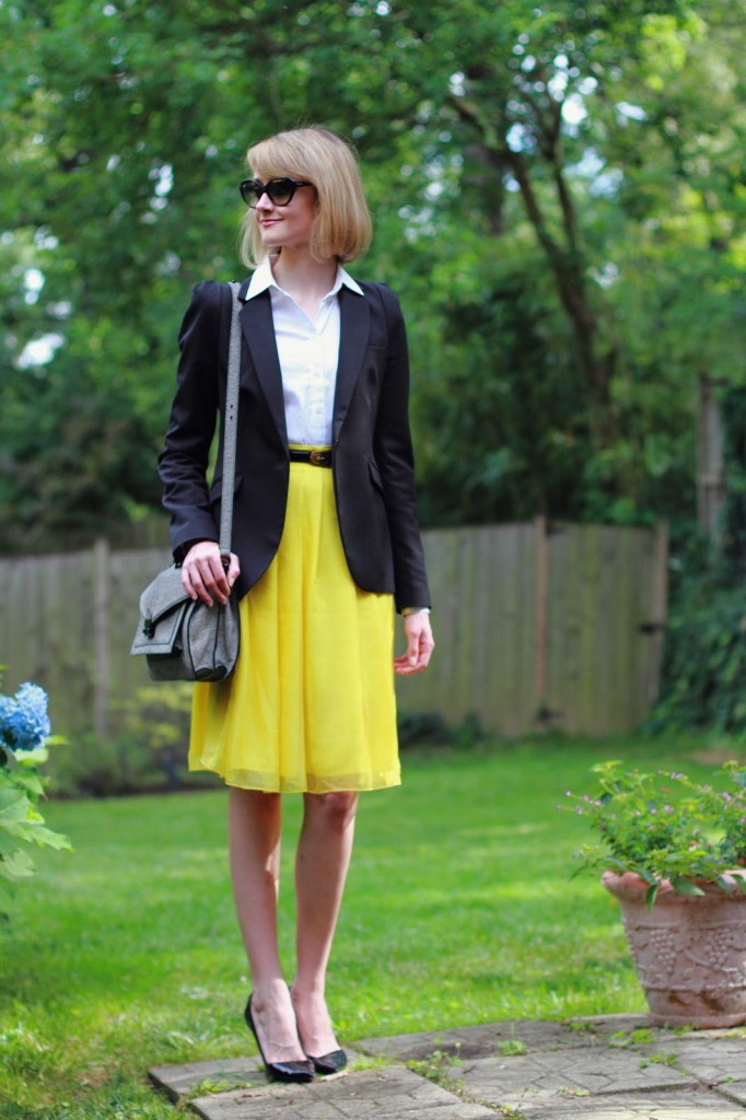 black blazer and yellow skirt