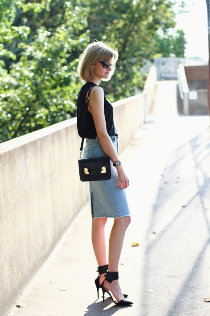 District of Chic: black top, denim skirt and ankle strap heels