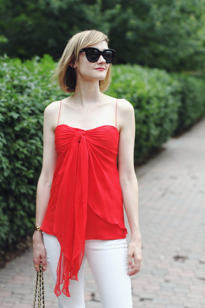 red top and cat eye sunglasses