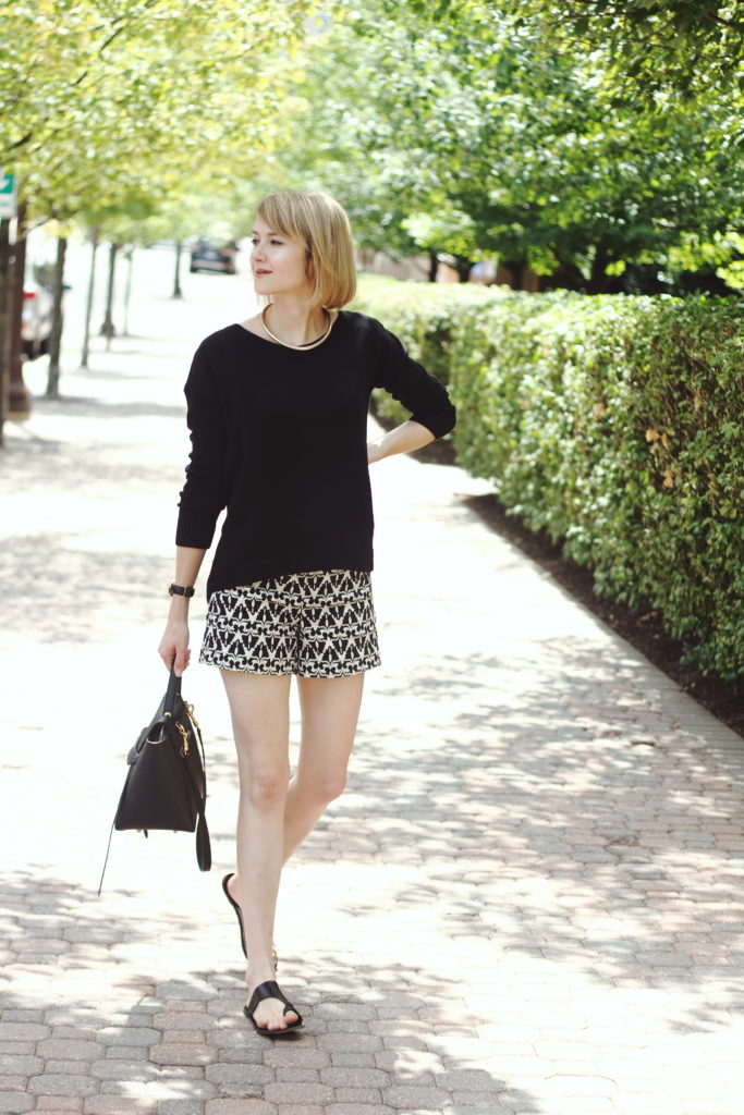 Express sweater, geo print shorts, and Celine bag