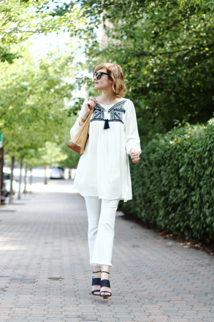 white tunic and cropped denim
