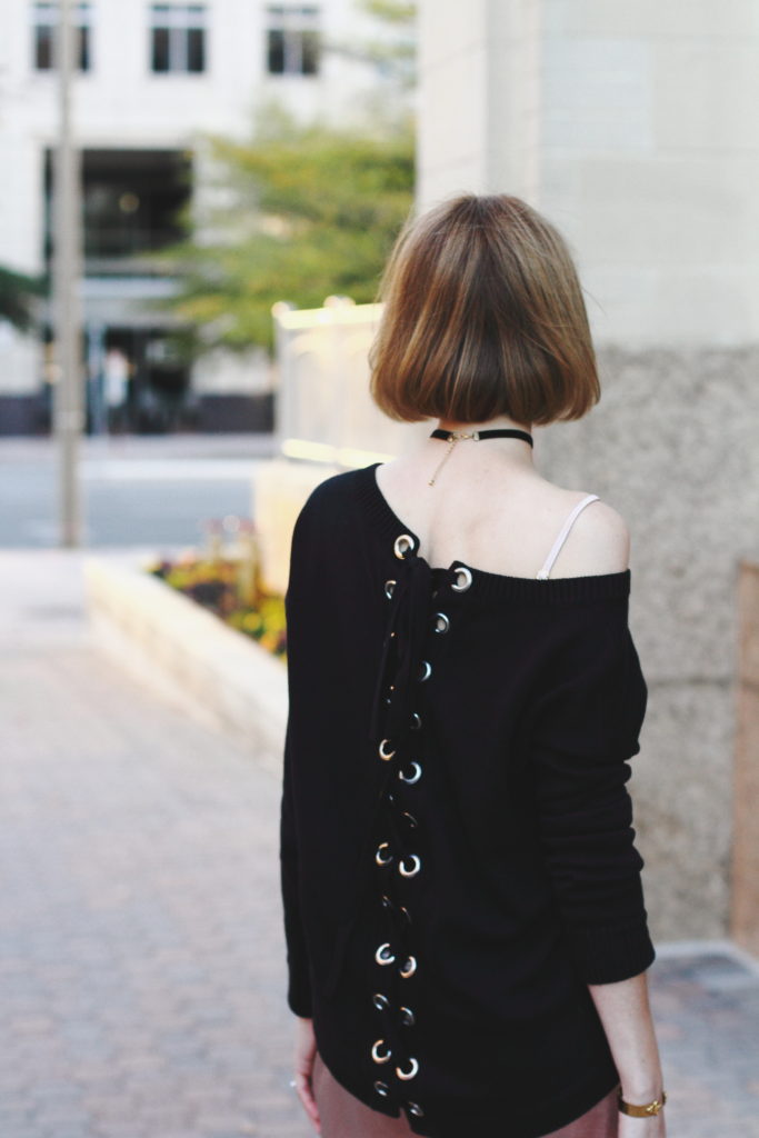 slip dress and lace-up sweater