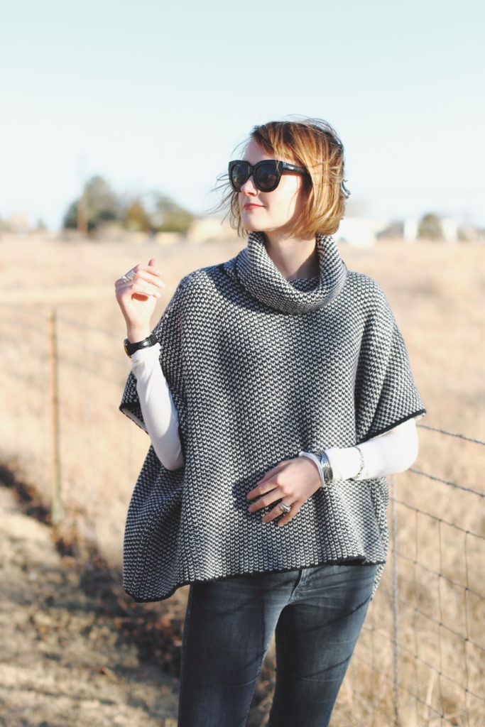 Woolovers poncho and Quay sunglasses