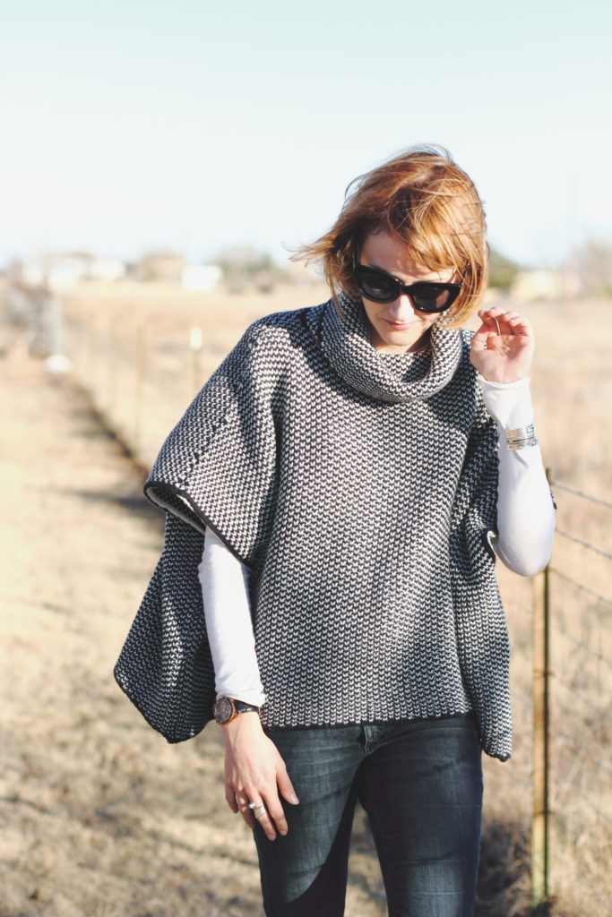 Woolovers poncho and Quay sunglasses