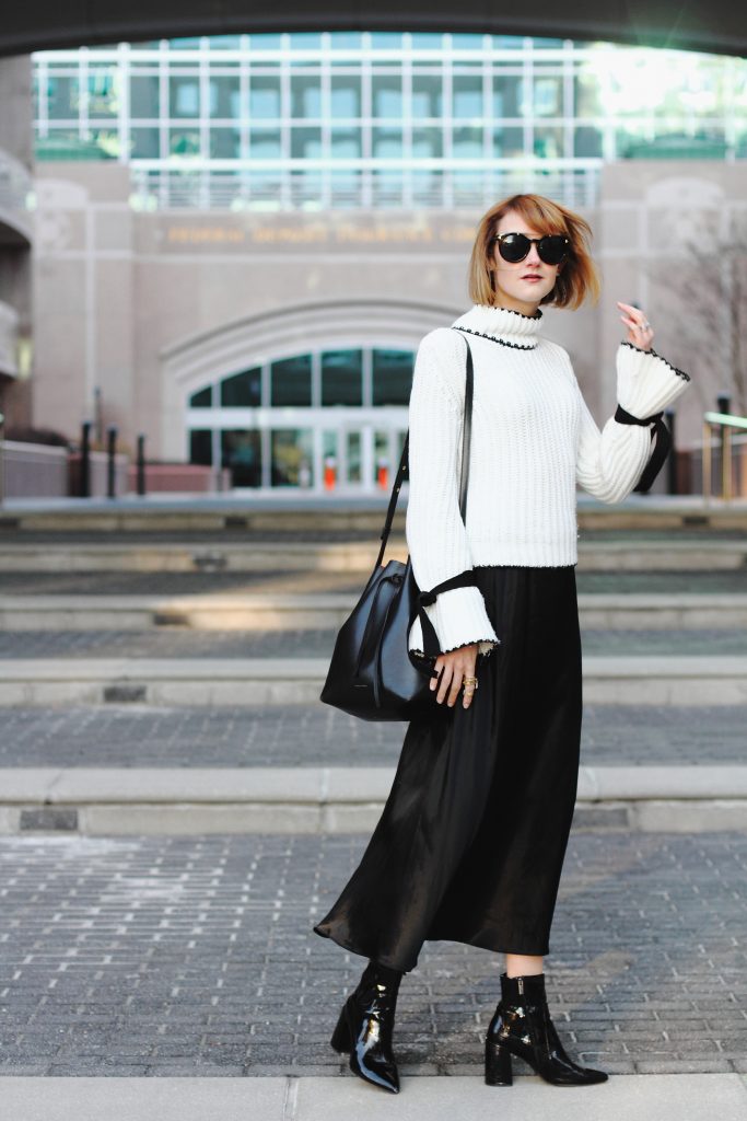 flare sleeve sweater, satin skirt and patent ankle boots