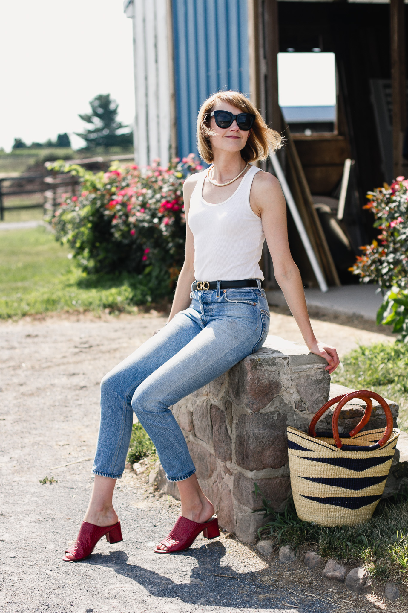 white tank top, Re/Done jeans and red mules