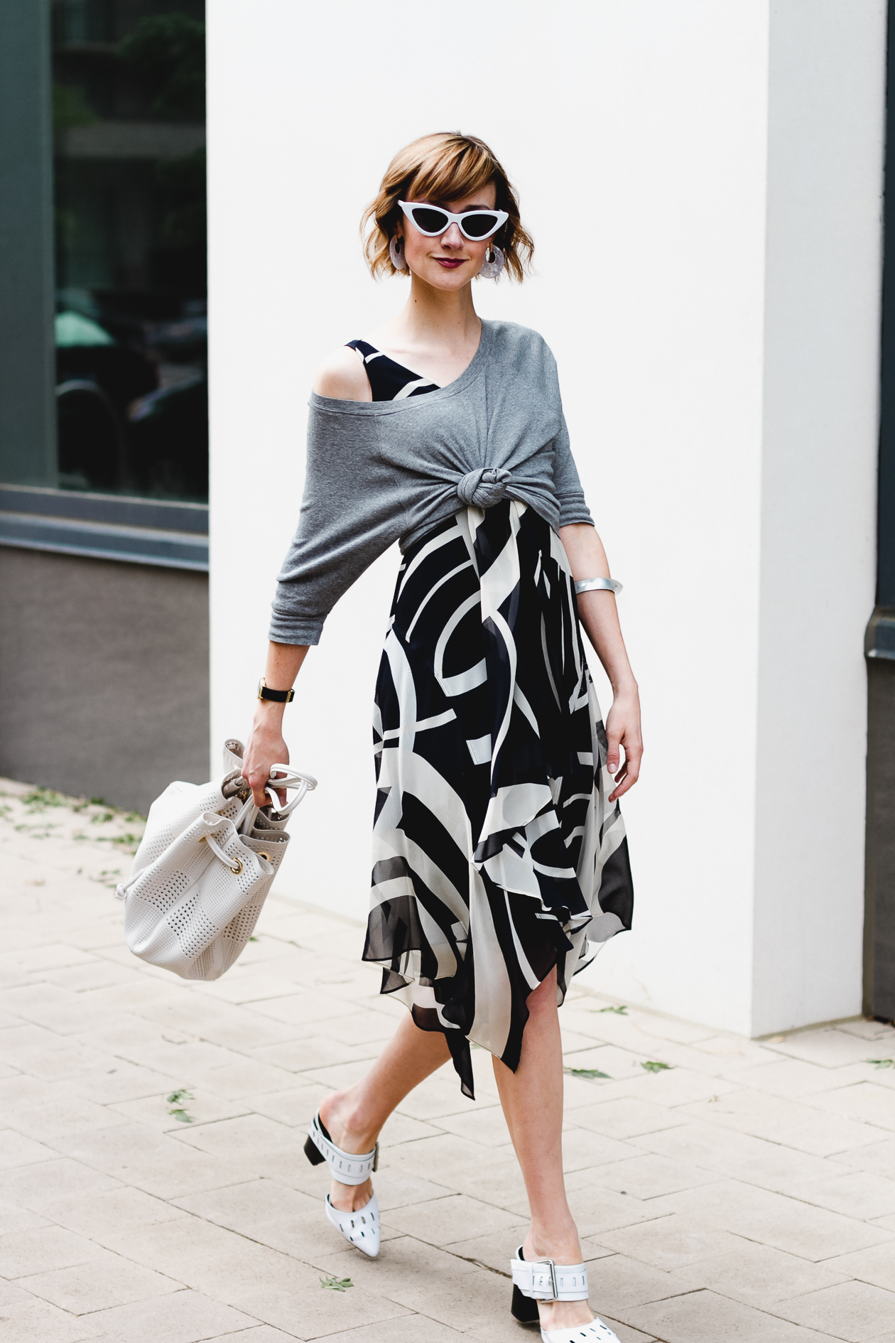 knotted sweatshirt over dress
