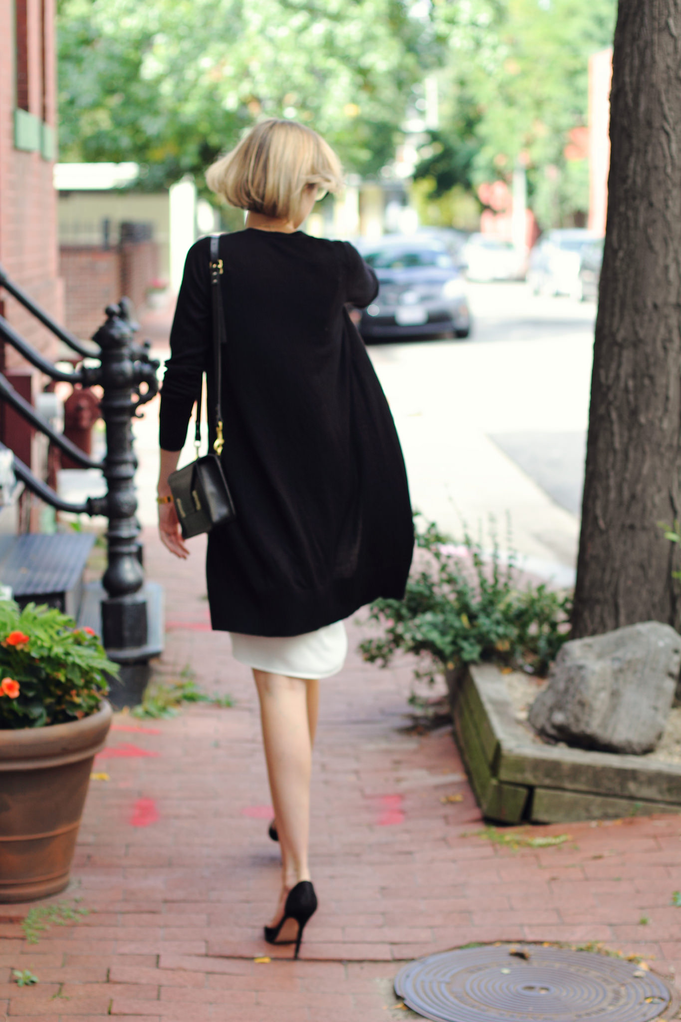 white Oasis slip dress and oversized cardigan