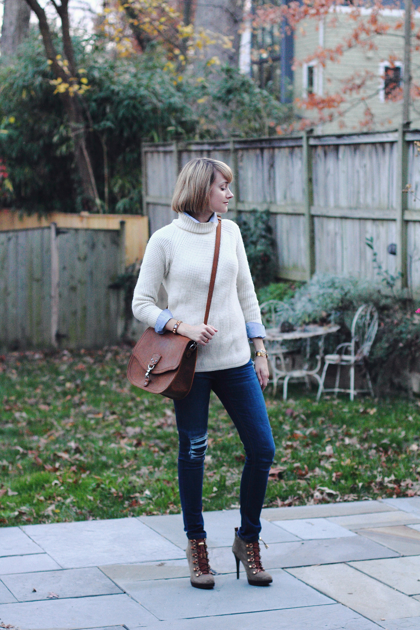 Banana Republic sweater and Saddleback Leather bag