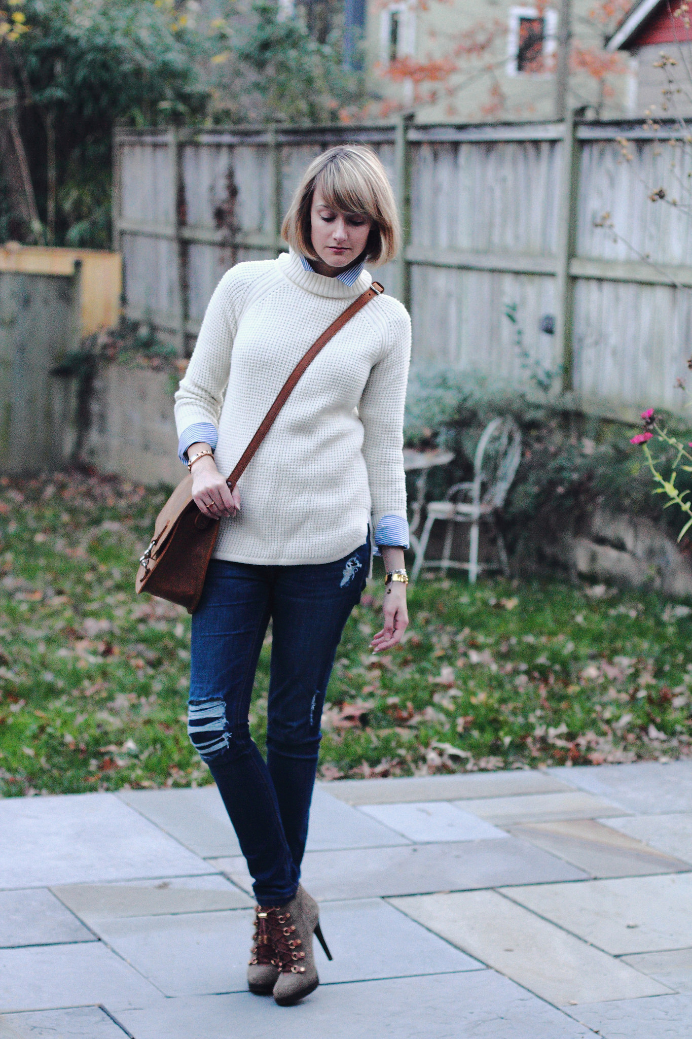 Banana Republic sweater and Saddleback Leather bag