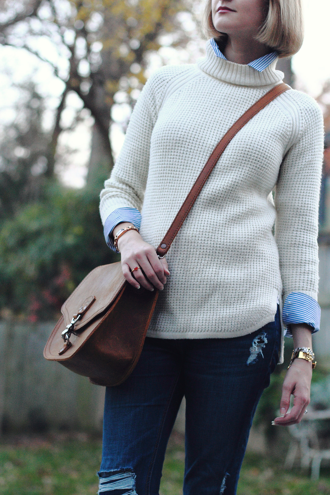 Banana Republic sweater and Saddleback Leather bag