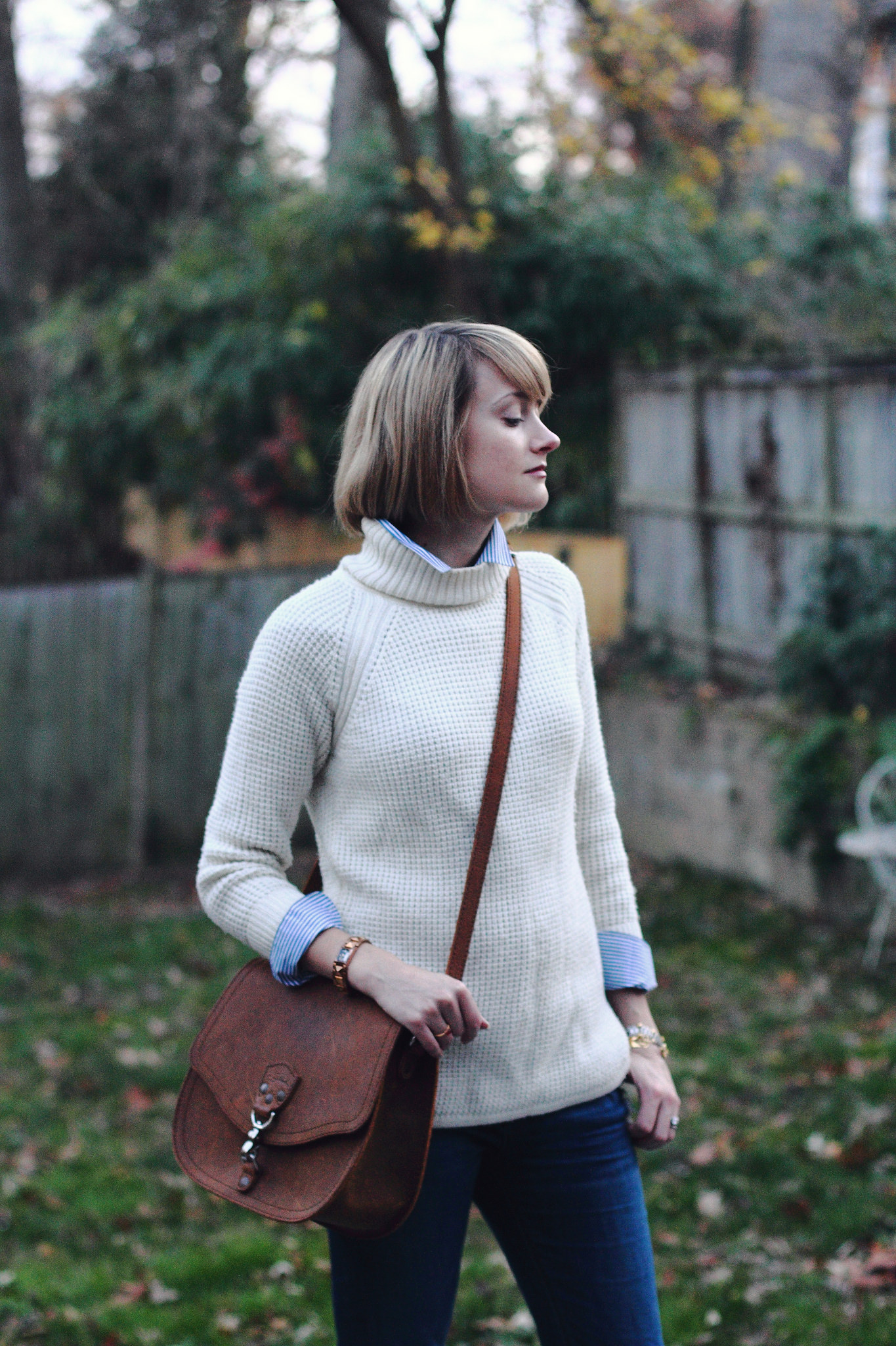 Banana Republic sweater and Saddleback Leather bag