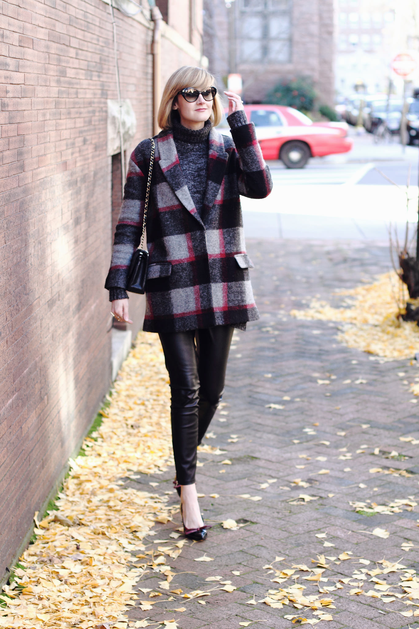 plaid coat and leather leggings