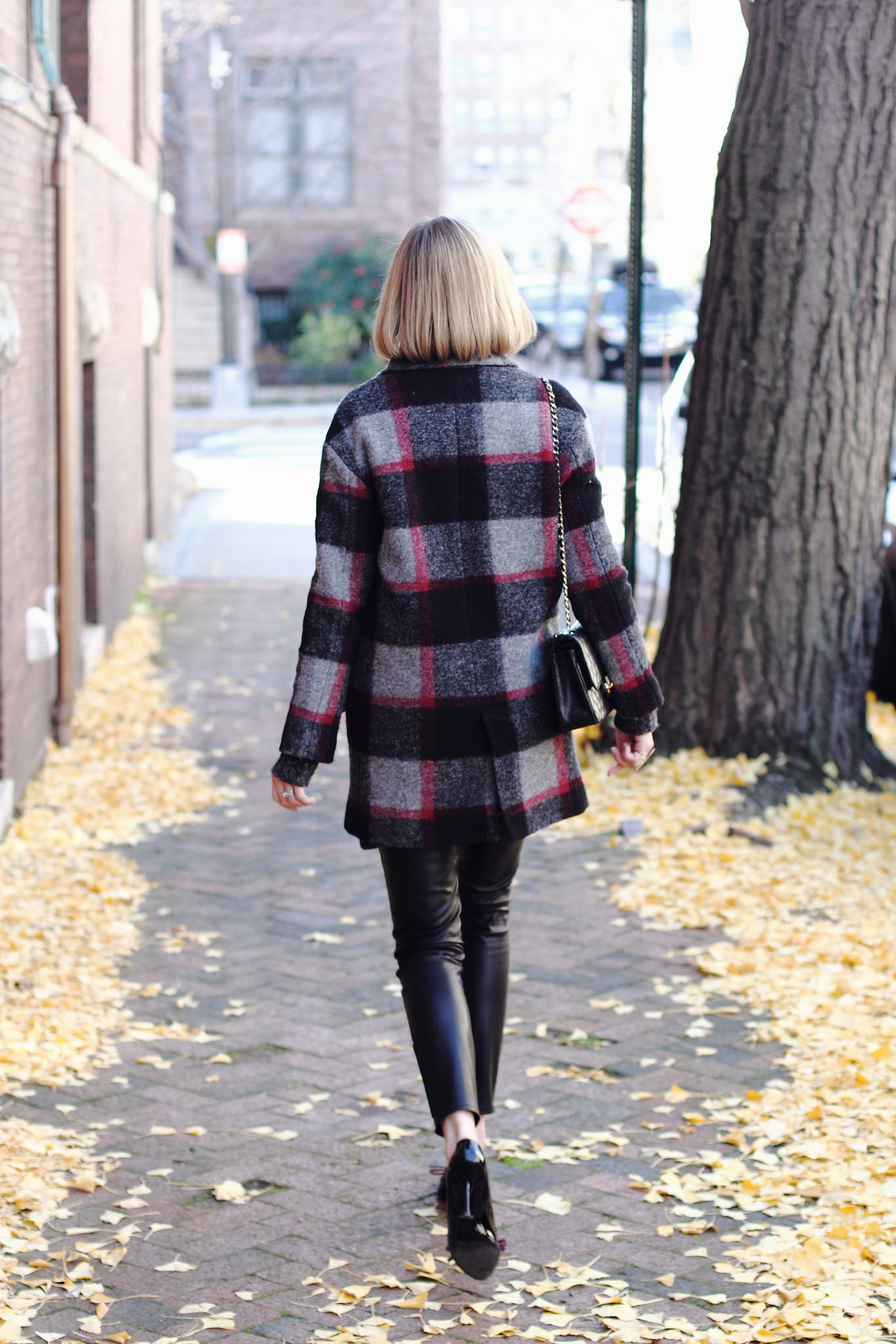 plaid coat and leather leggings