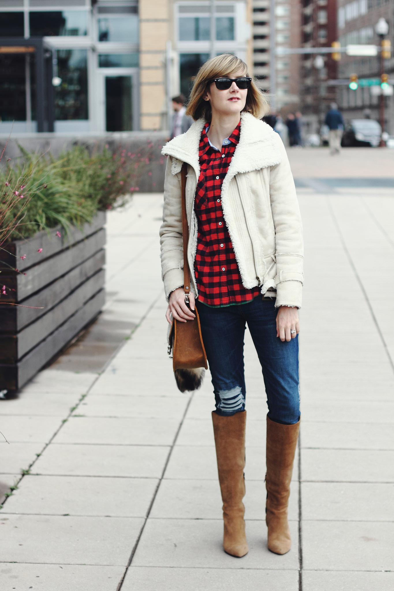 buffalo plaid shirt, Mango shearling jacket, and Saddleback leather bag