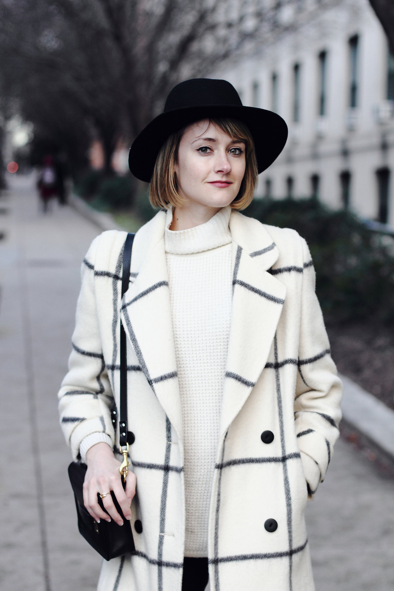 vintage check coat and black fedora