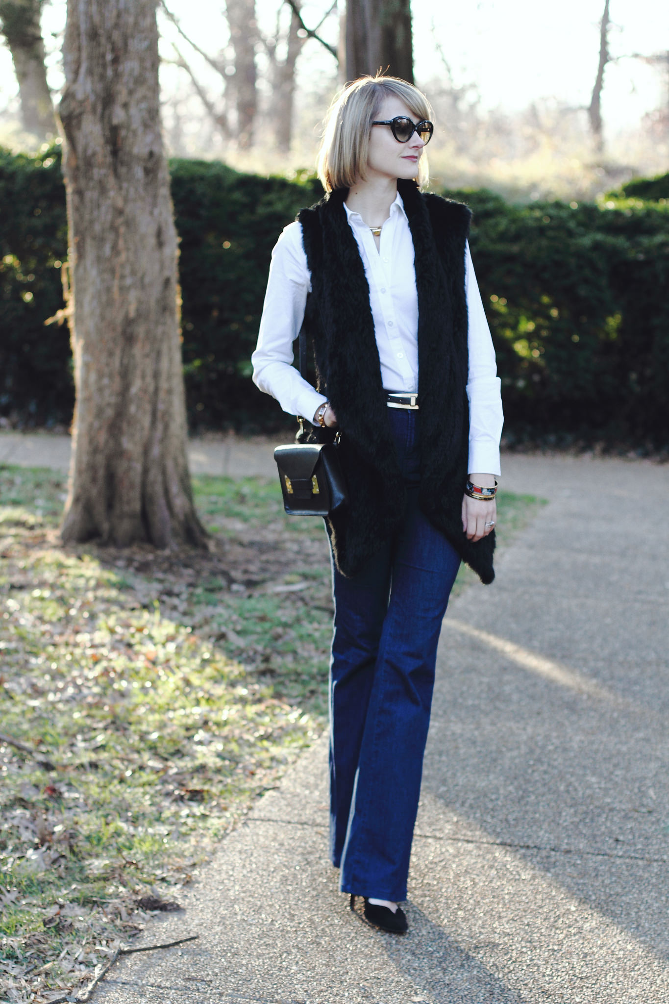 Tsalt fur vest and J Brand flared jeans