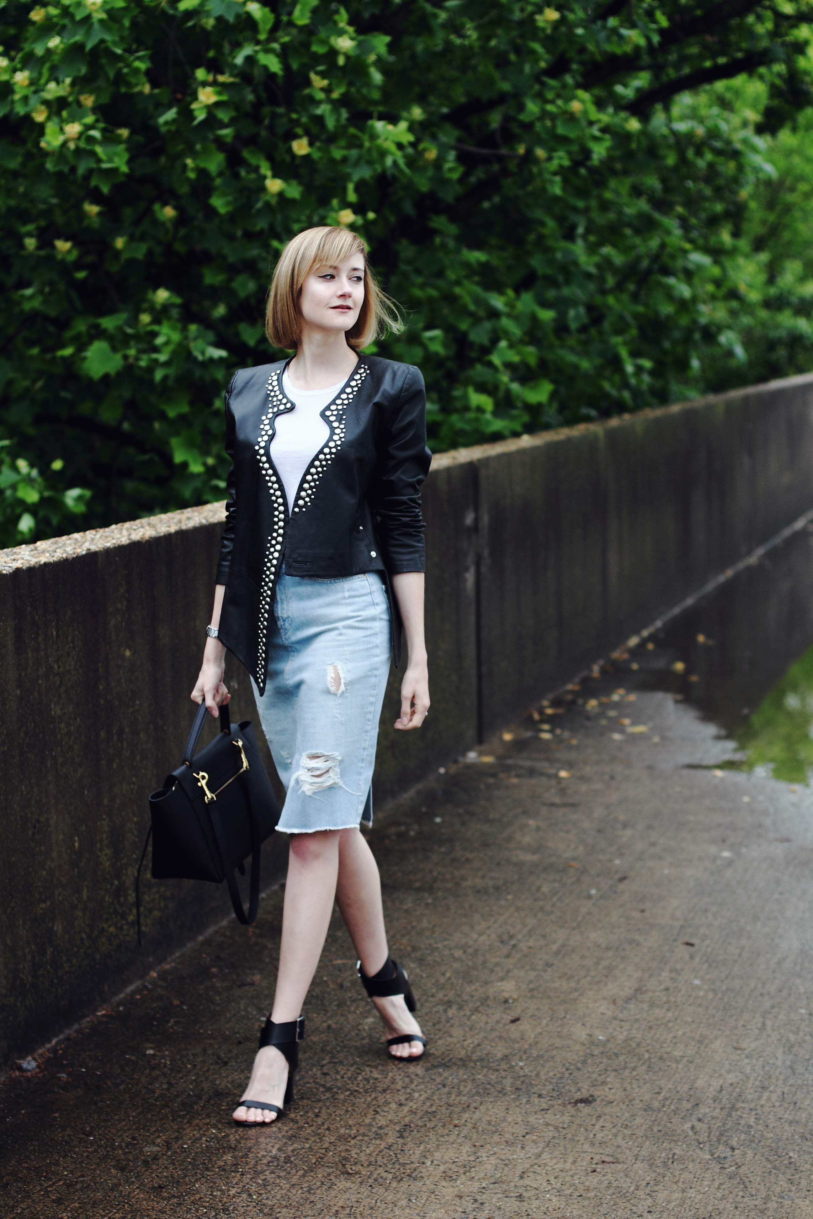 studded leather jacket and distressed denim skirt