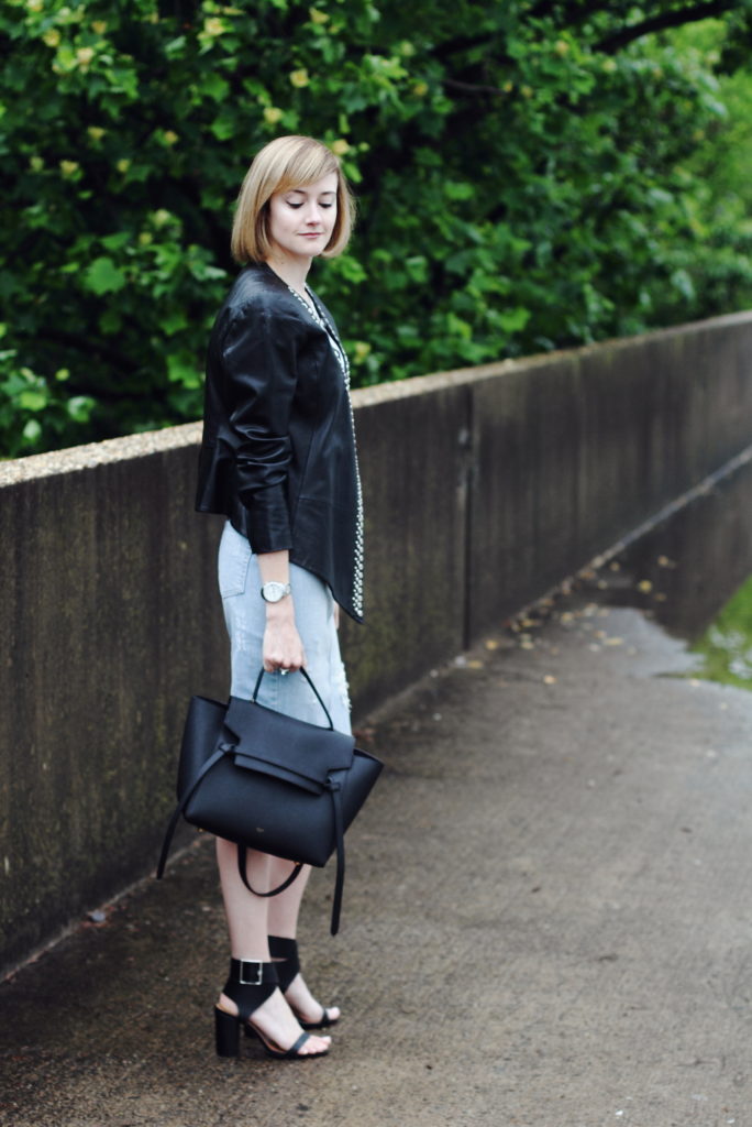 studded leather jacket and distressed denim skirt