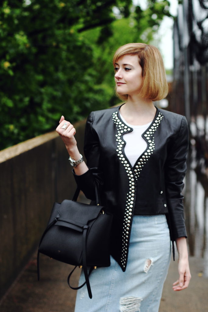 studded leather jacket and distressed denim skirt