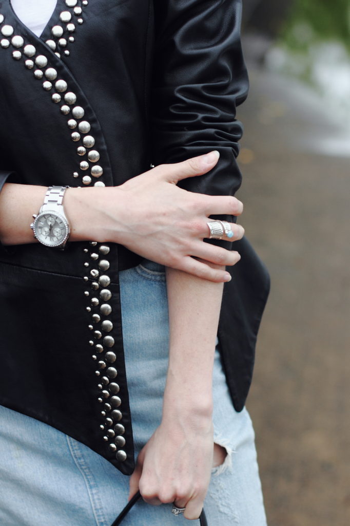 studded leather jacket and distressed denim skirt