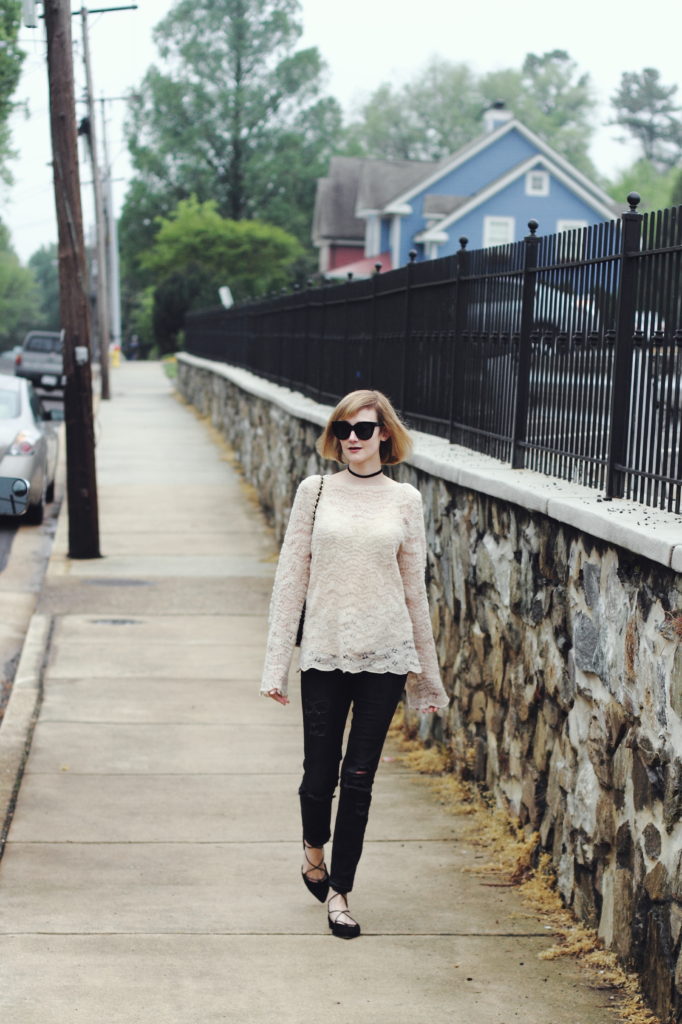 bell-sleeved sweater and distressed denim