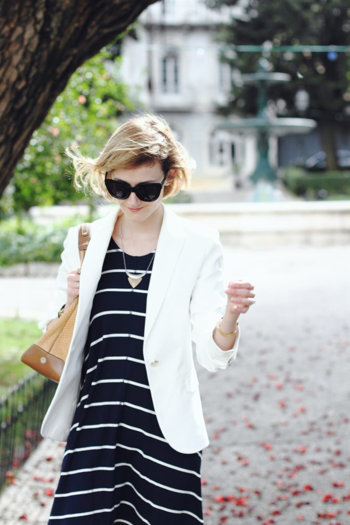 white blazer and striped navy dress