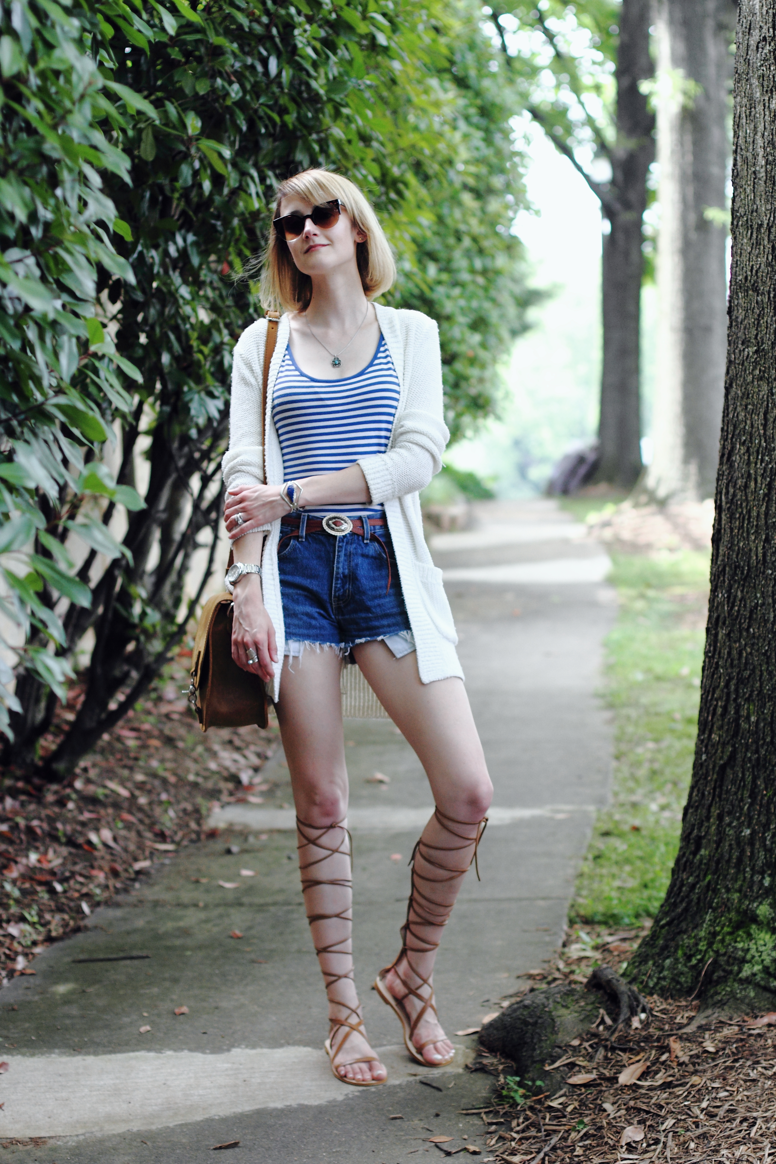 striped top, cut-offs, and lace-up gladiators