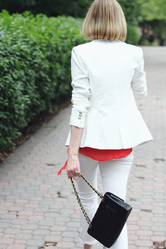 white blazer, white denim and chanel bag