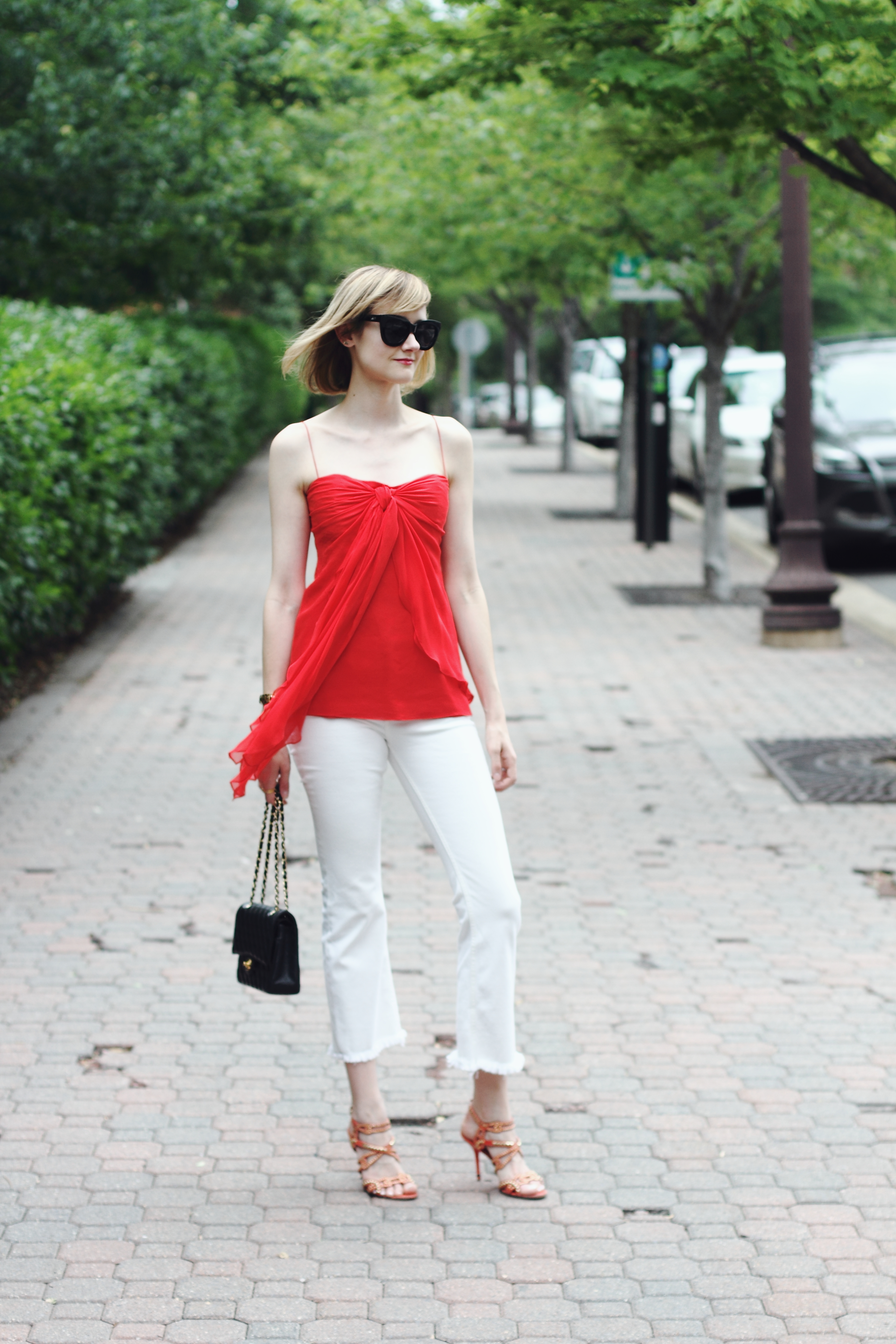 red top and white crop denim