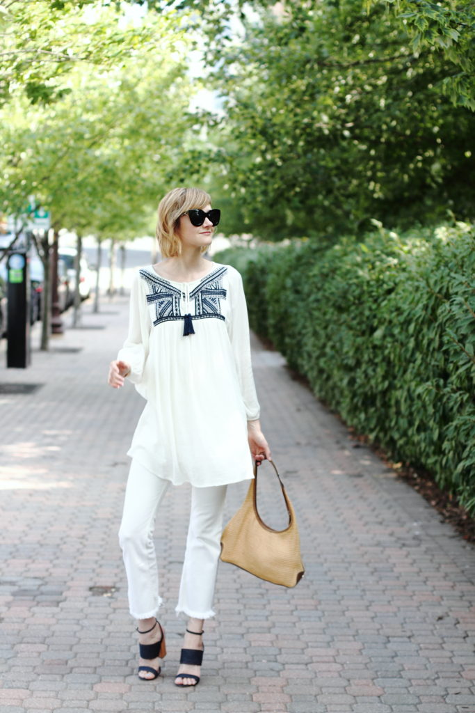 white tunic and cropped denim