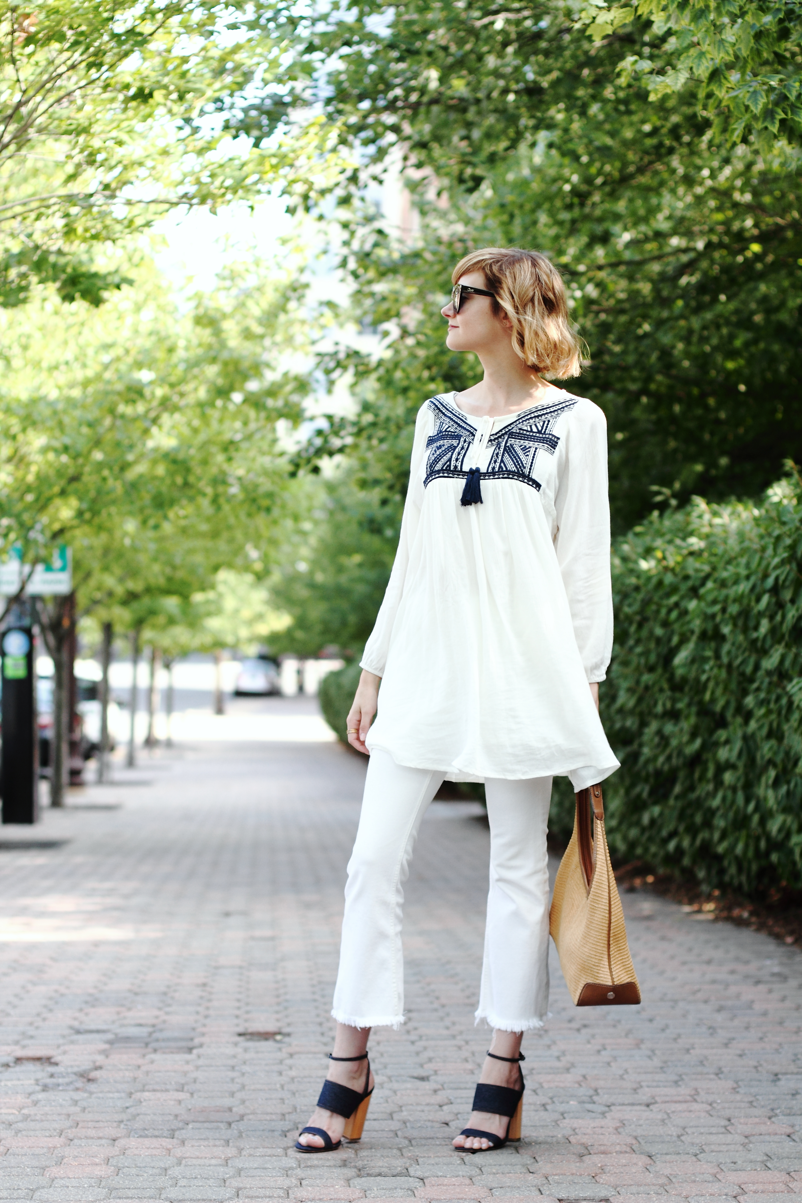 white tunic and cropped denim