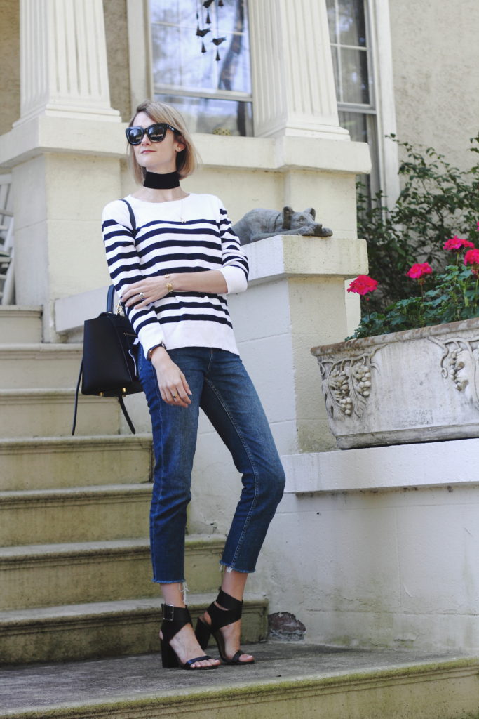 wide choker, striped sweater and raw edge denim