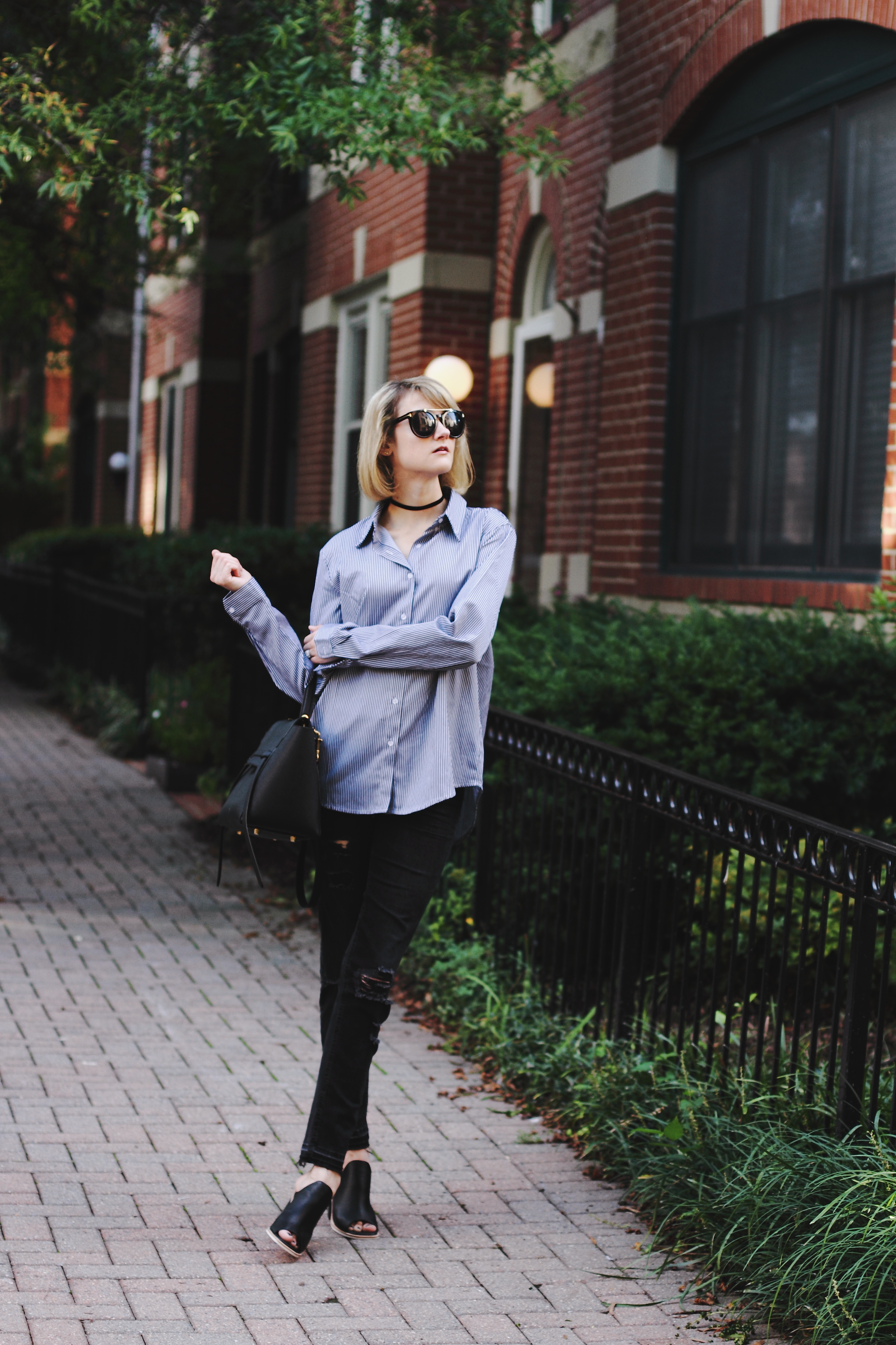 oversized button-down and distressed jeans