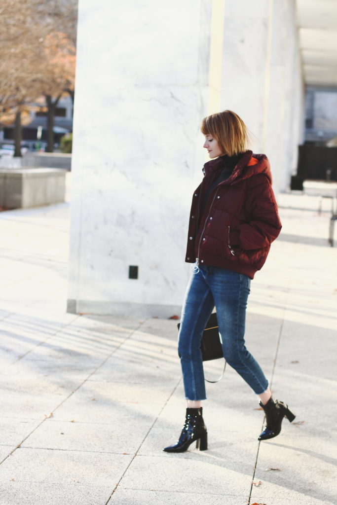 puffer, cropped denim & patent boots