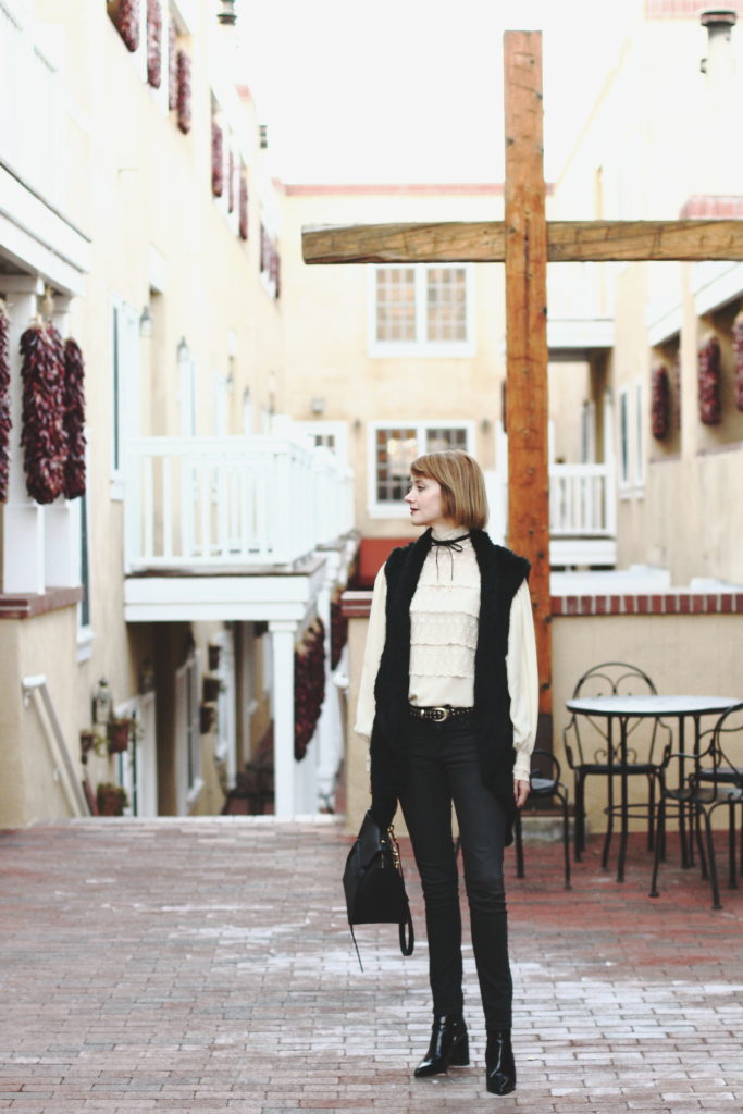 vintage lace blouse, fur vest, denim, and ankle boots