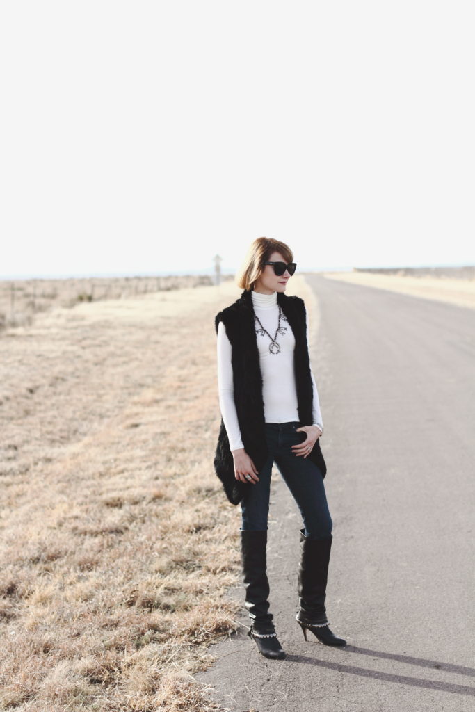 squash blossom necklace, fur vest and OTK boots