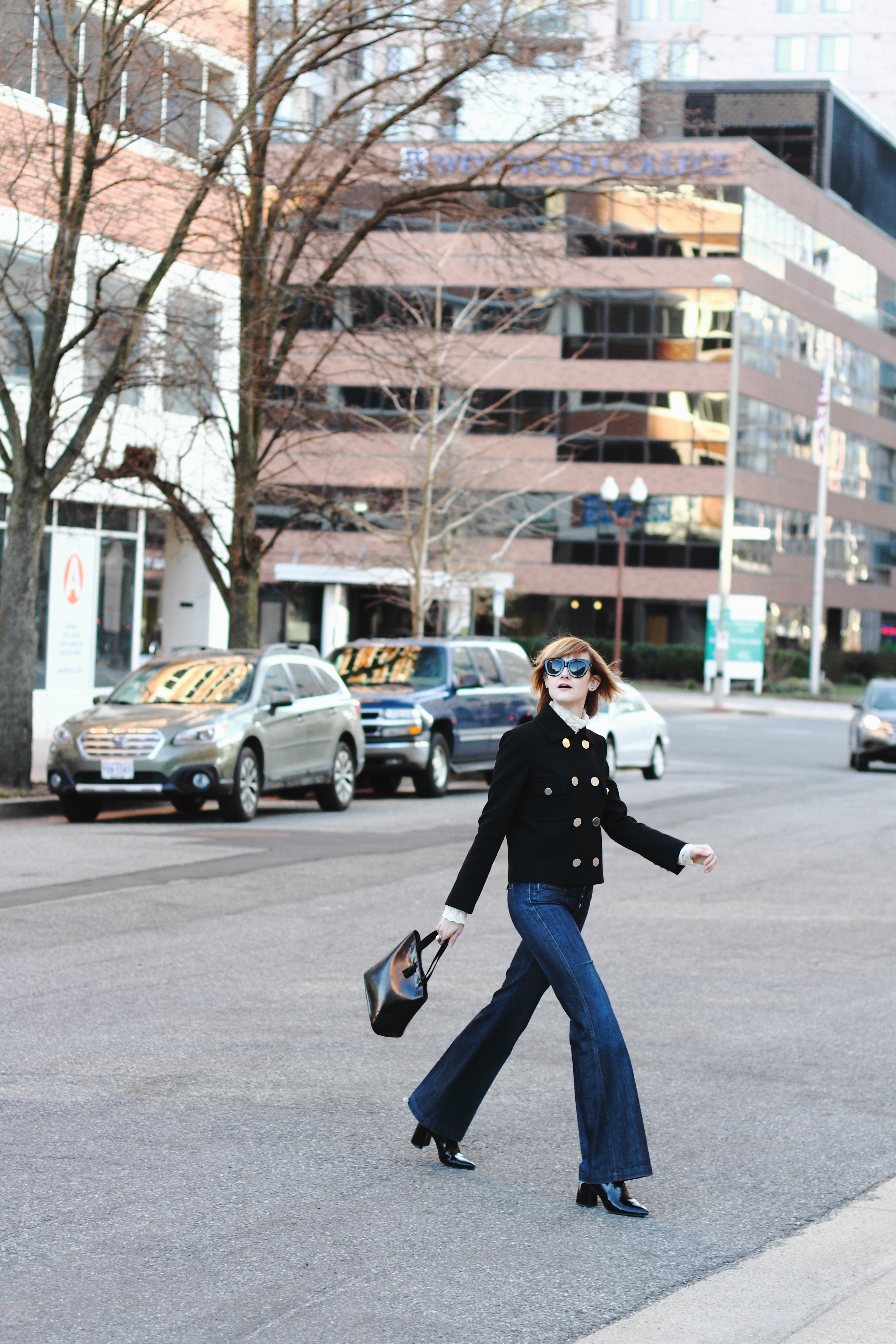 Gucci jacket, 7 For All Mankind jeans, and patent boots