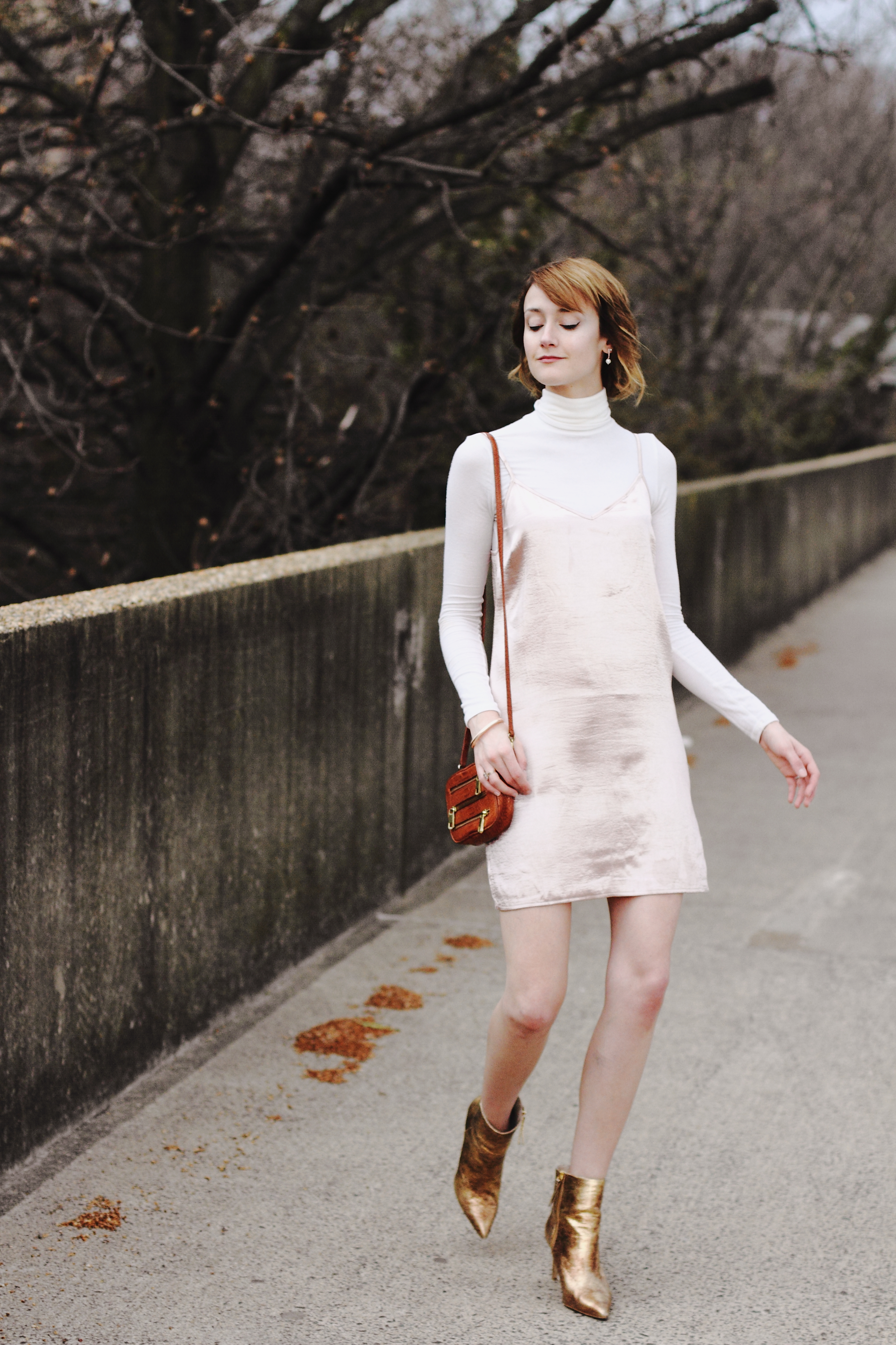 Reformation turtleneck, Genuine People slip dress and gold ankle boots
