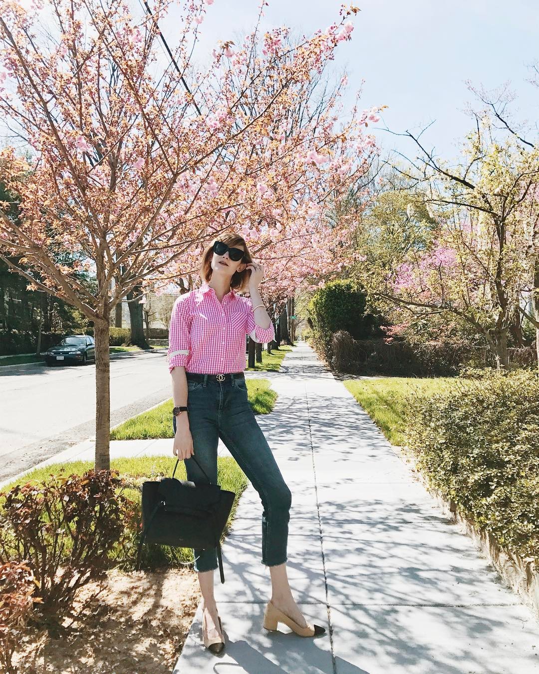 gingham shirt, cropped jeans, and cap-toe heels