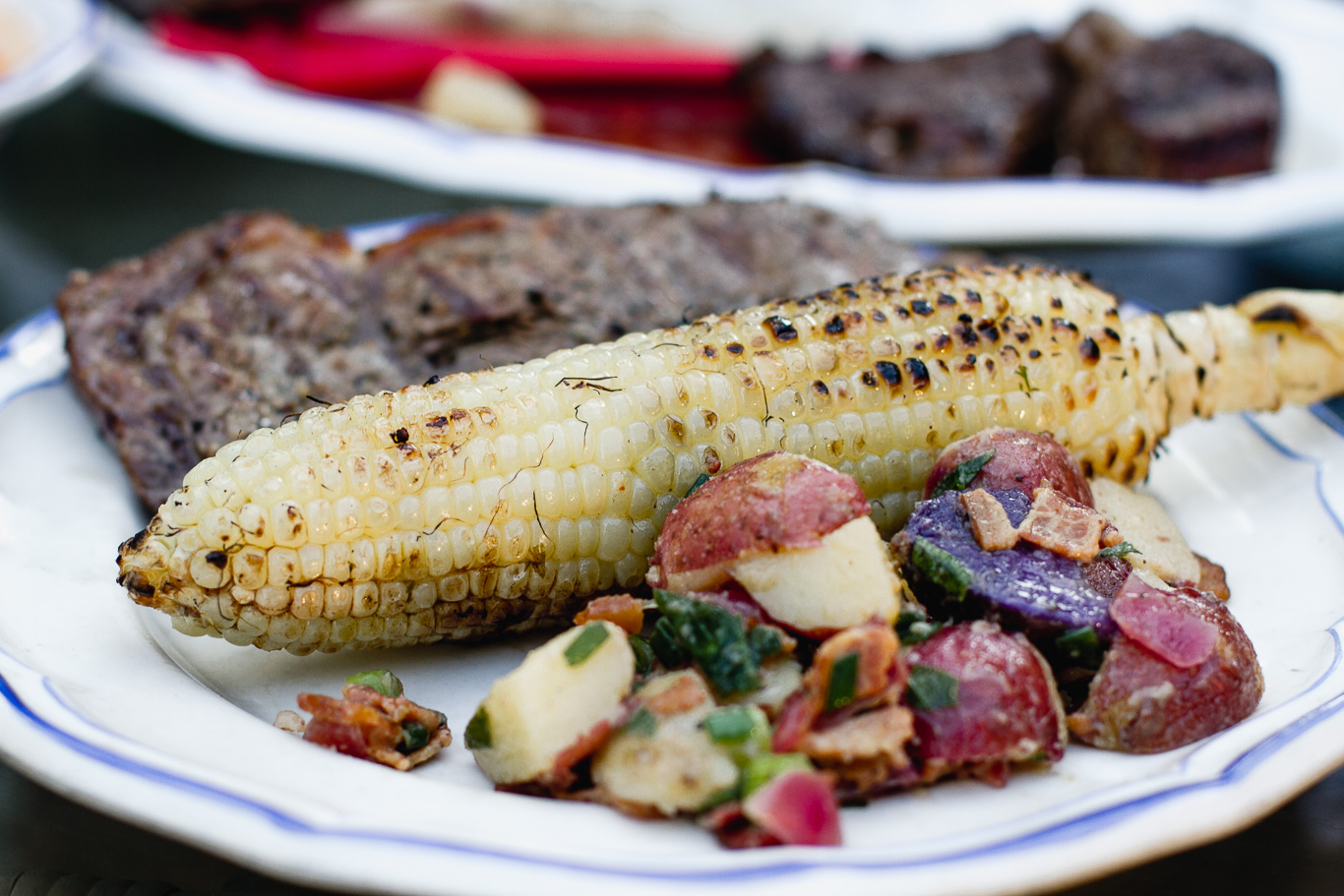 Grilled Steak with Chimichurri, Warm Potato Salad, and Cilantro Lime Corn on the Cob