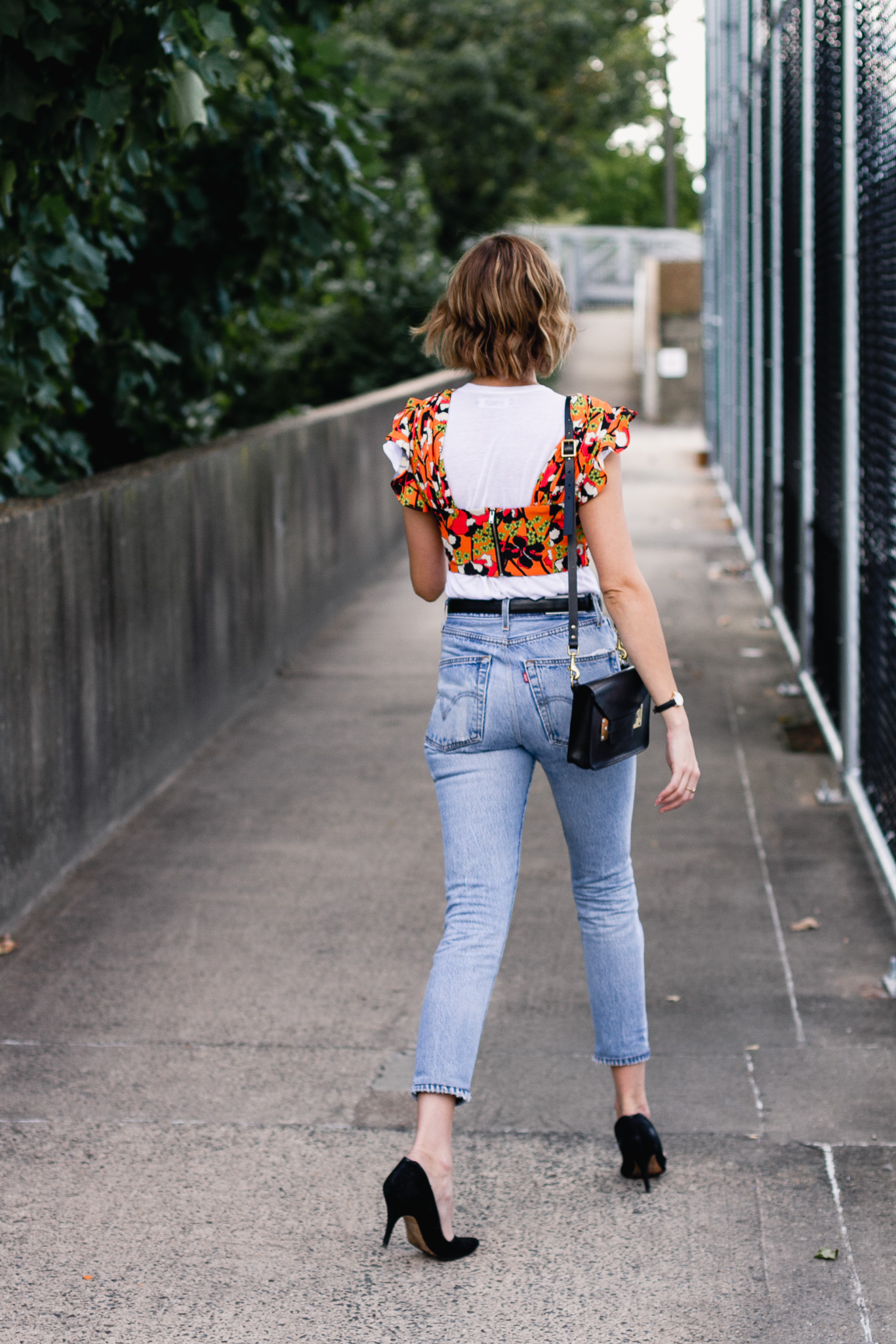 Mango crop top, Ferragamo belt, and Re/Done jeans