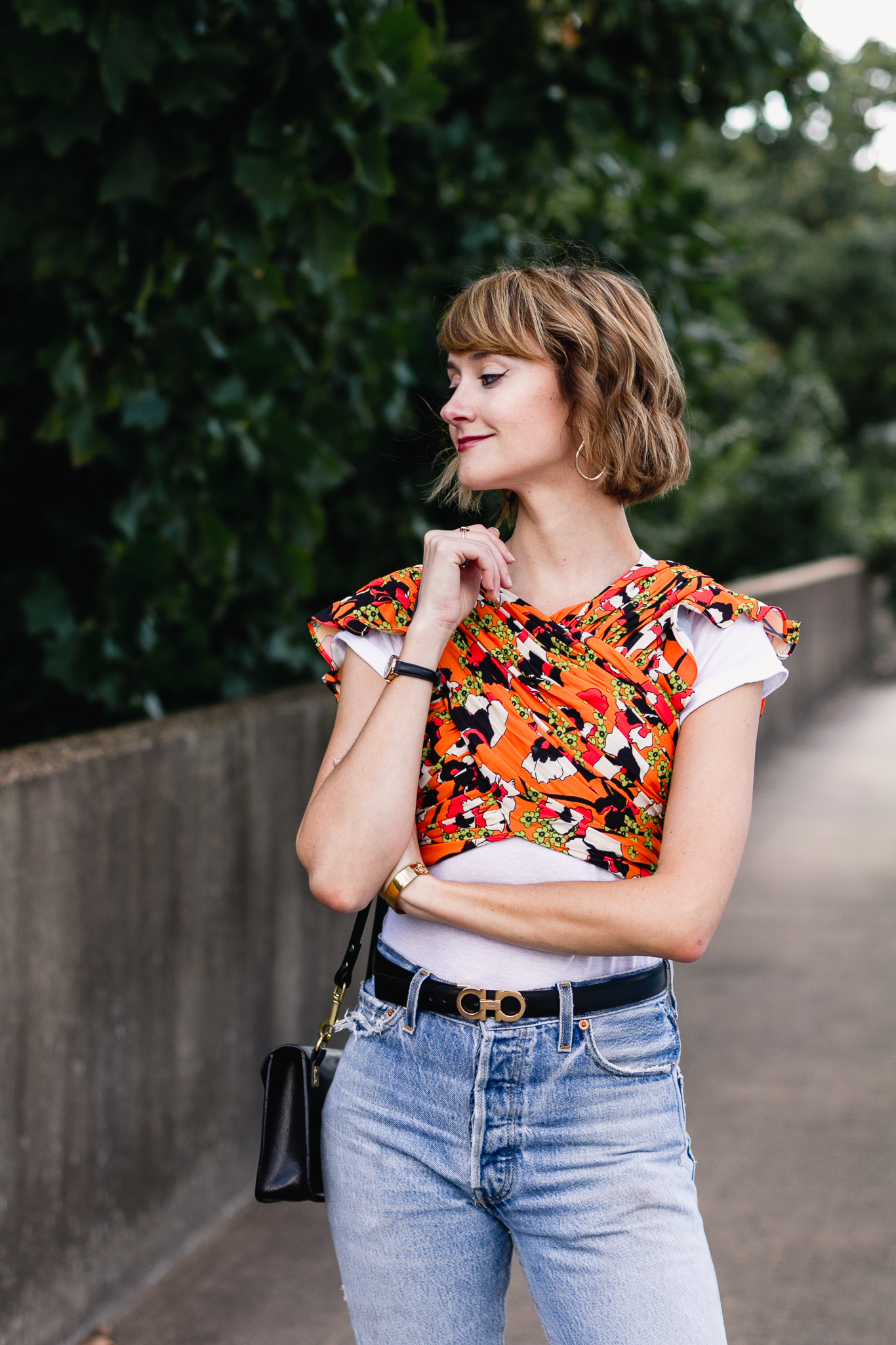 Mango crop top, Ferragamo belt, and Re/Done jeans