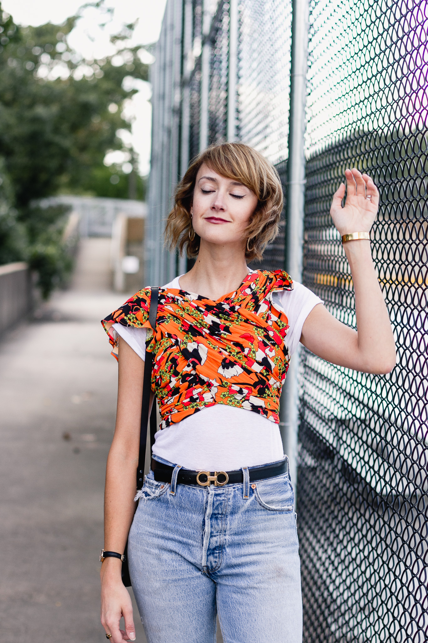 Mango crop top, Ferragamo belt, and Re/Done jeans