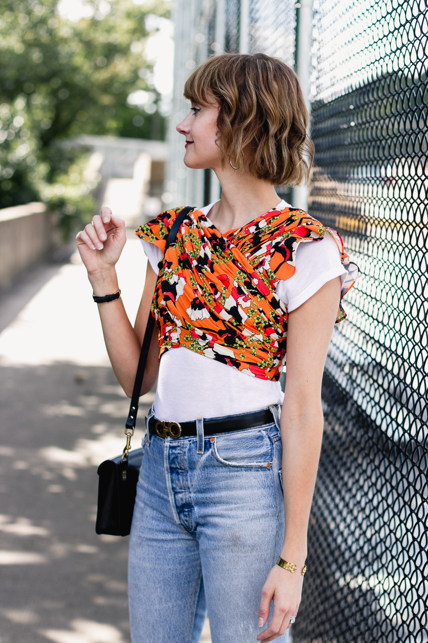 Mango crop top, Ferragamo belt, and Re/Done jeans