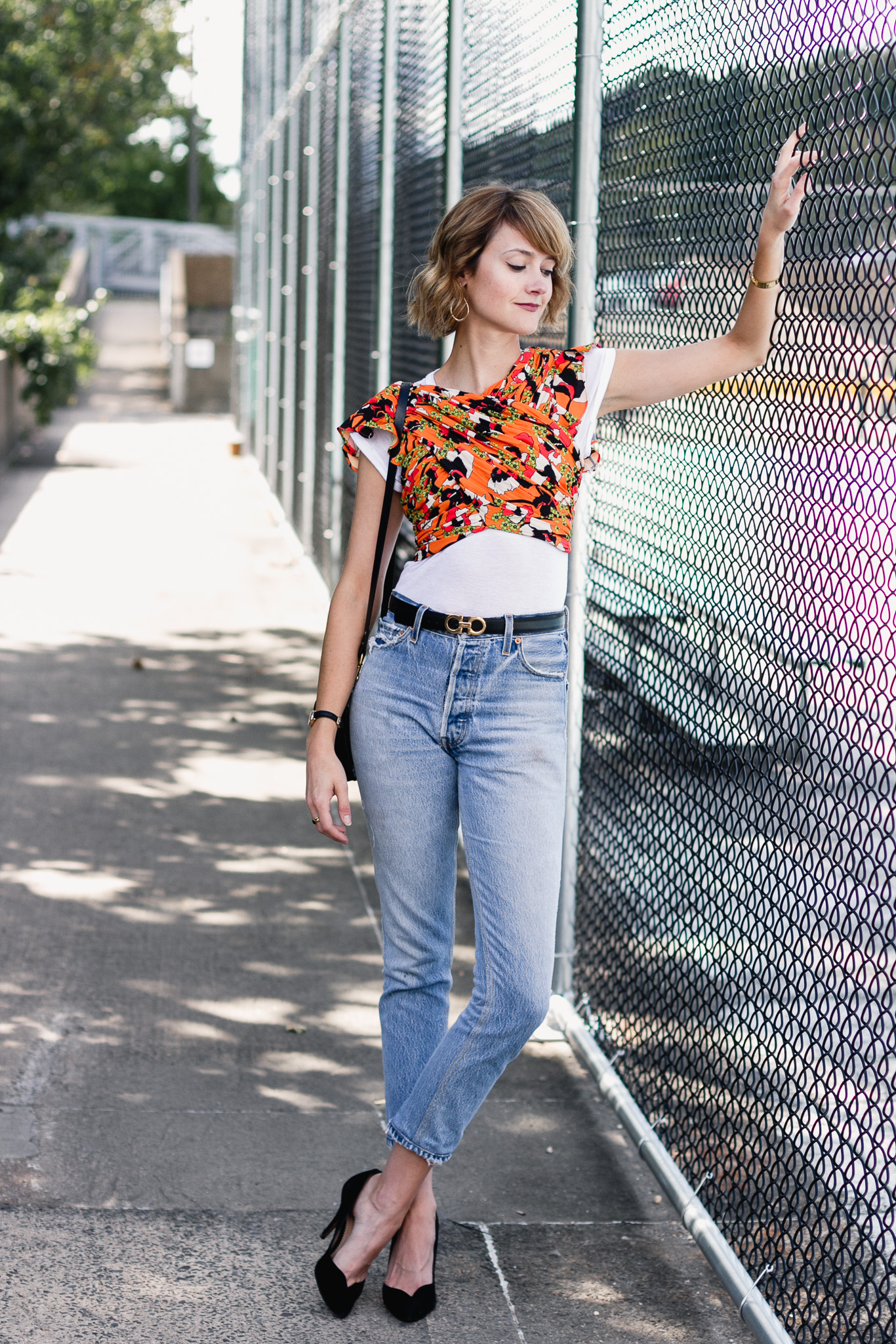 Mango crop top, Ferragamo belt, and Re/Done jeans