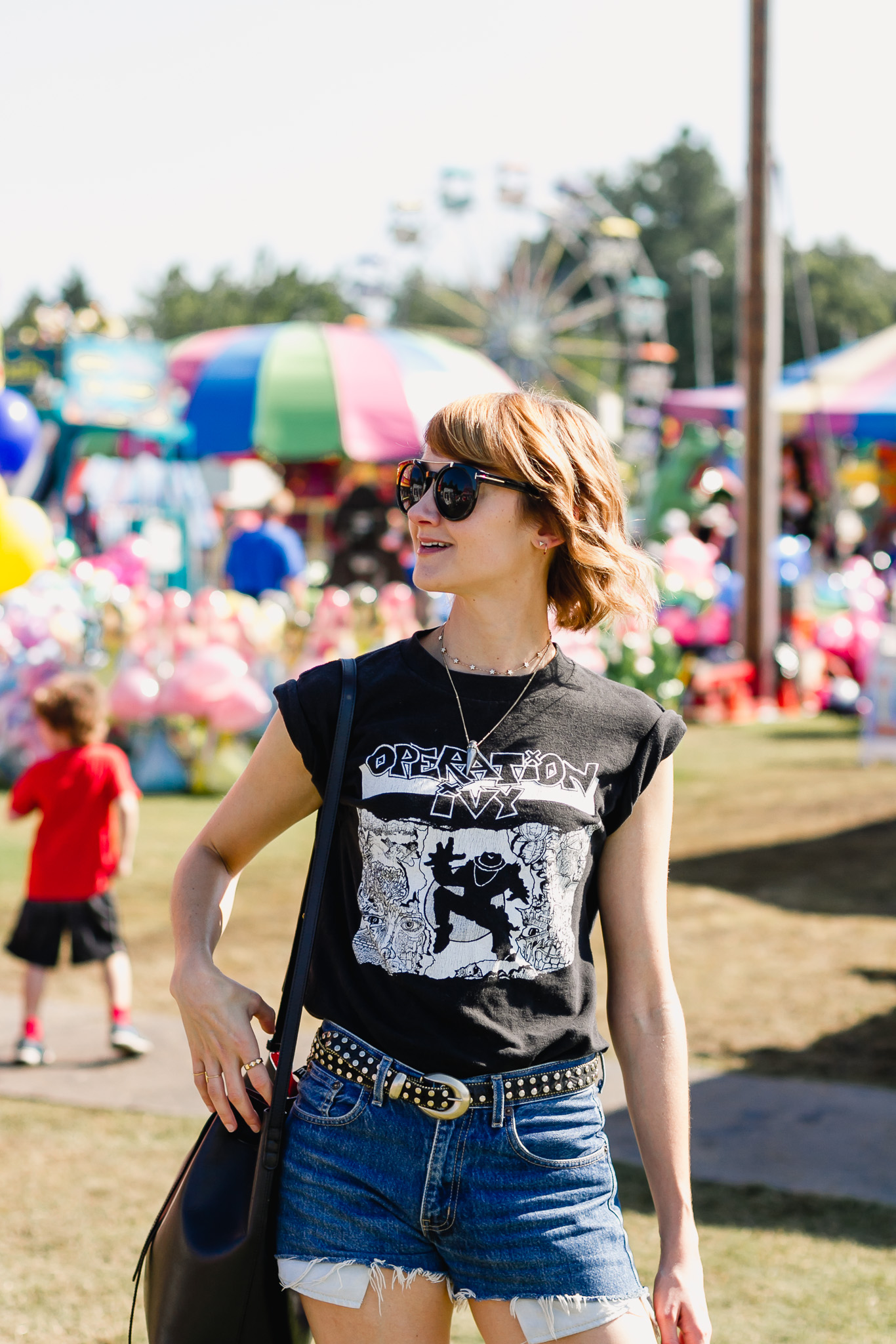 Op Ivy t-shirt, denim shorts, and Topshop western belt