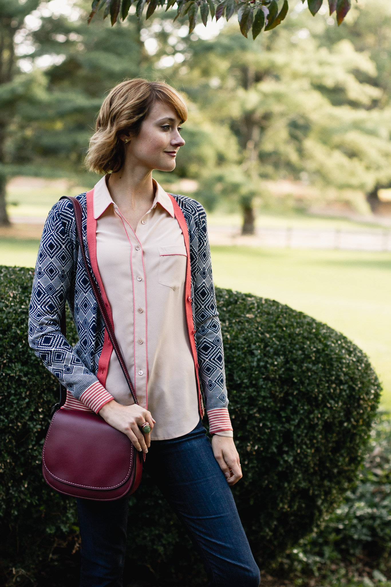 Tory Burch cardigan, Equipment button-down, and Coach bag