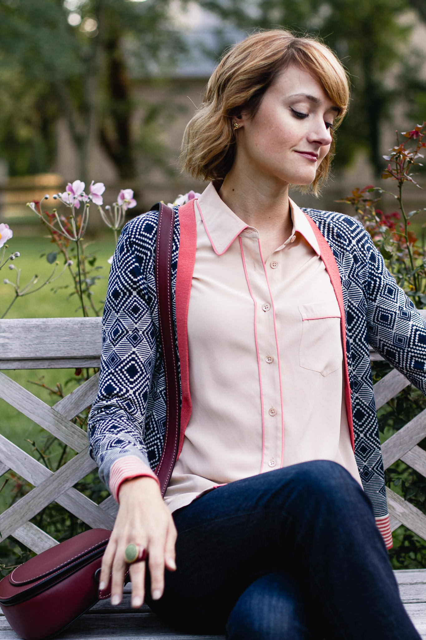 Tory Burch cardigan, Equipment button-down, and Coach bag