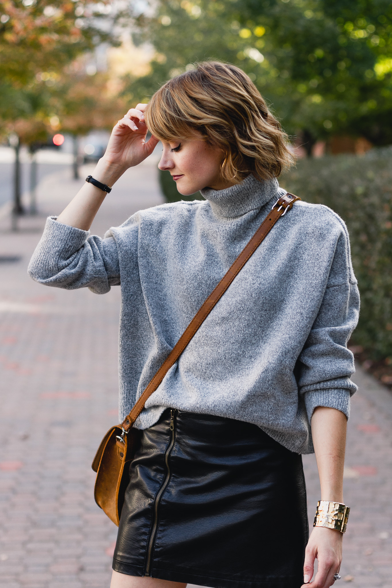 Genuine People sweater, leather skirt and Saddleback Leather bag